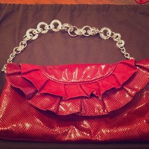 White House Black Market red clutch